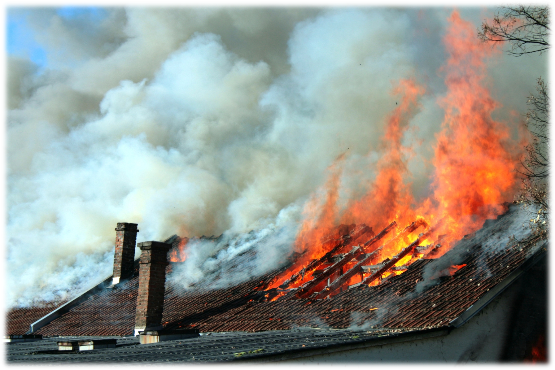 Link to Winter Fire Safety - House roof on fire with smoke 